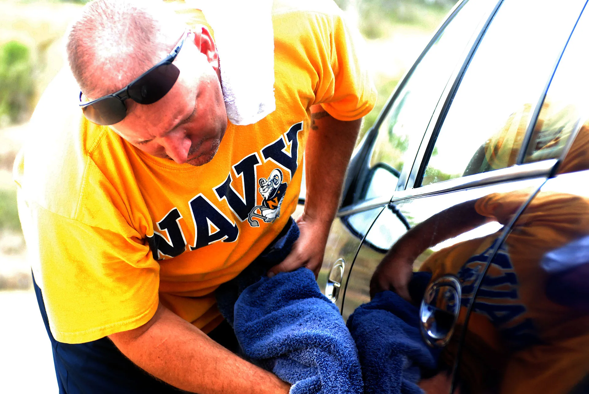 Navy Senior Chief Petty Officer Pat Zintel applies elbow grease as he dries a vehicle during a car wash fundraiser for Joint Task Force Guantanamo's Navy Expeditionary Guard Battalion Chief Petty Officer Association, July 19, 2008, at U.S. Naval Station Guantanamo Bay's car wash lot. The funds suppo. The new-hire checklist for a car wash business